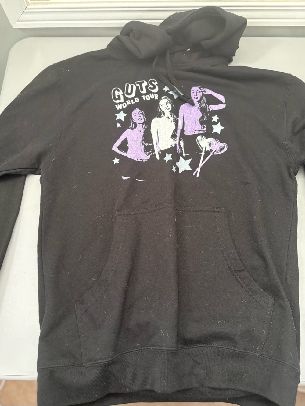 GUTS World Tour Black Hoodie with Lavender Graphic